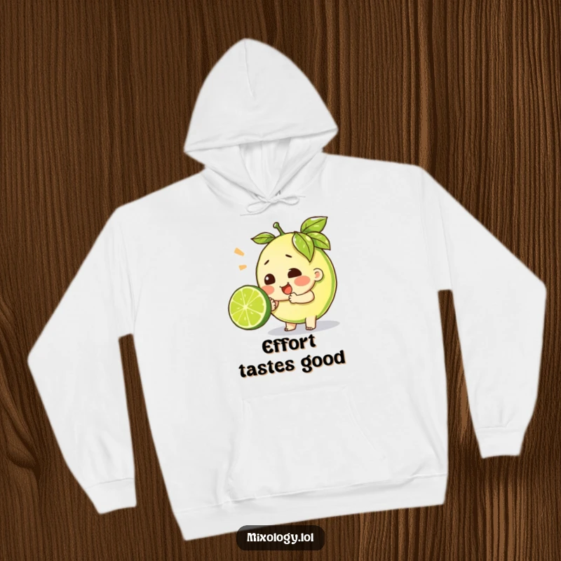 Funny hoodie depicting a character putting in maximum effort to squeeze a lime, offering cozy humor and relatability.