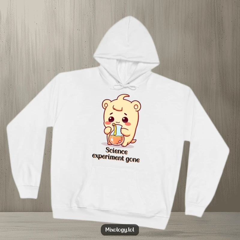 Funny hoodie depicting a surprised kawaii scientist character comically pouring colorful liquid from a beaker, looking utterly shocked.